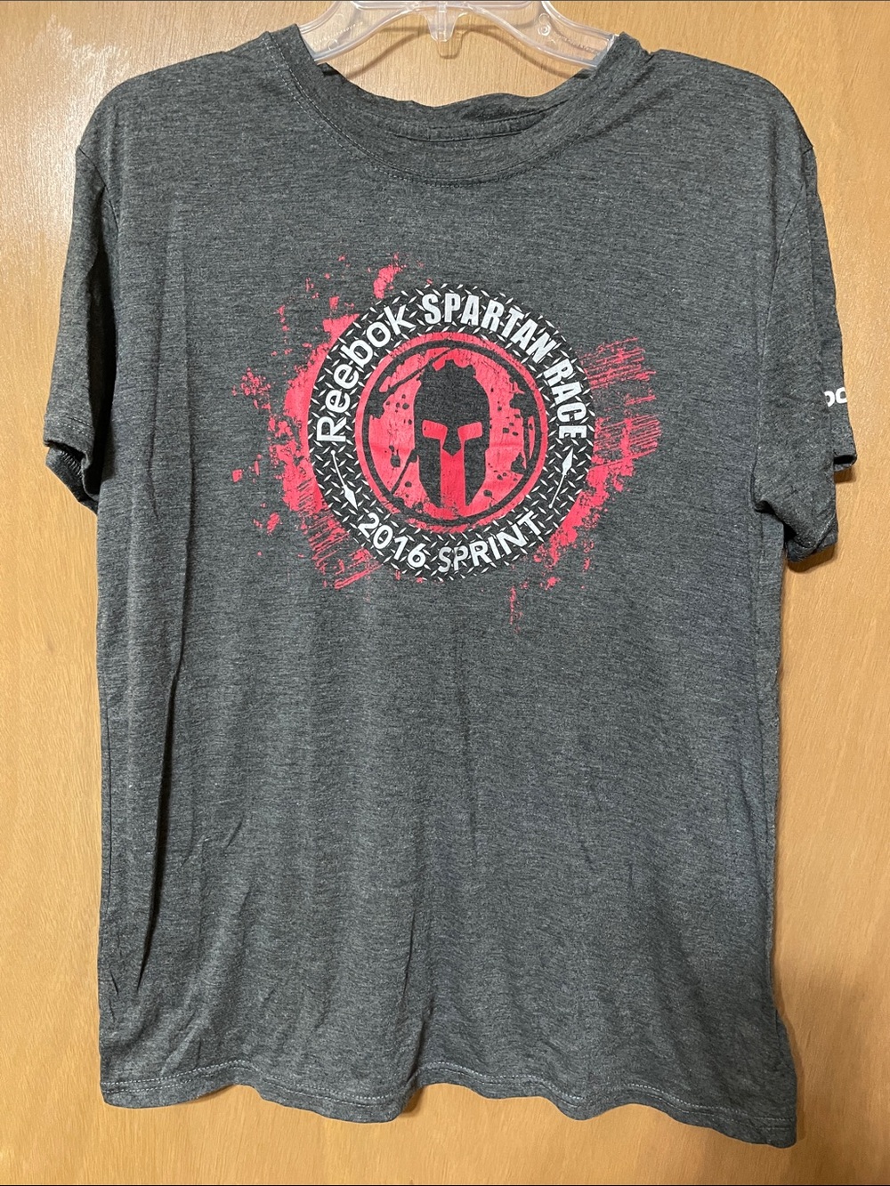 Reebok Men's Dark Gray Graphic Spartan Race Tee with Red Logo